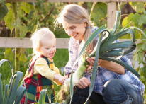 Photo of a grandmother in the garden with her grandchild. Link to Life Stage Gift Planner Ages 60-70 Gifts. Photo of a grandmother in the garden with her grandchild. Link to Life Stage Gift Planner Ages 60-70 Gifts.